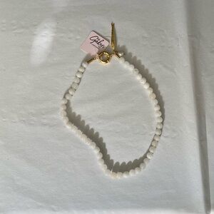 Gaby's White Beaded Necklace with Gold Fish Charm